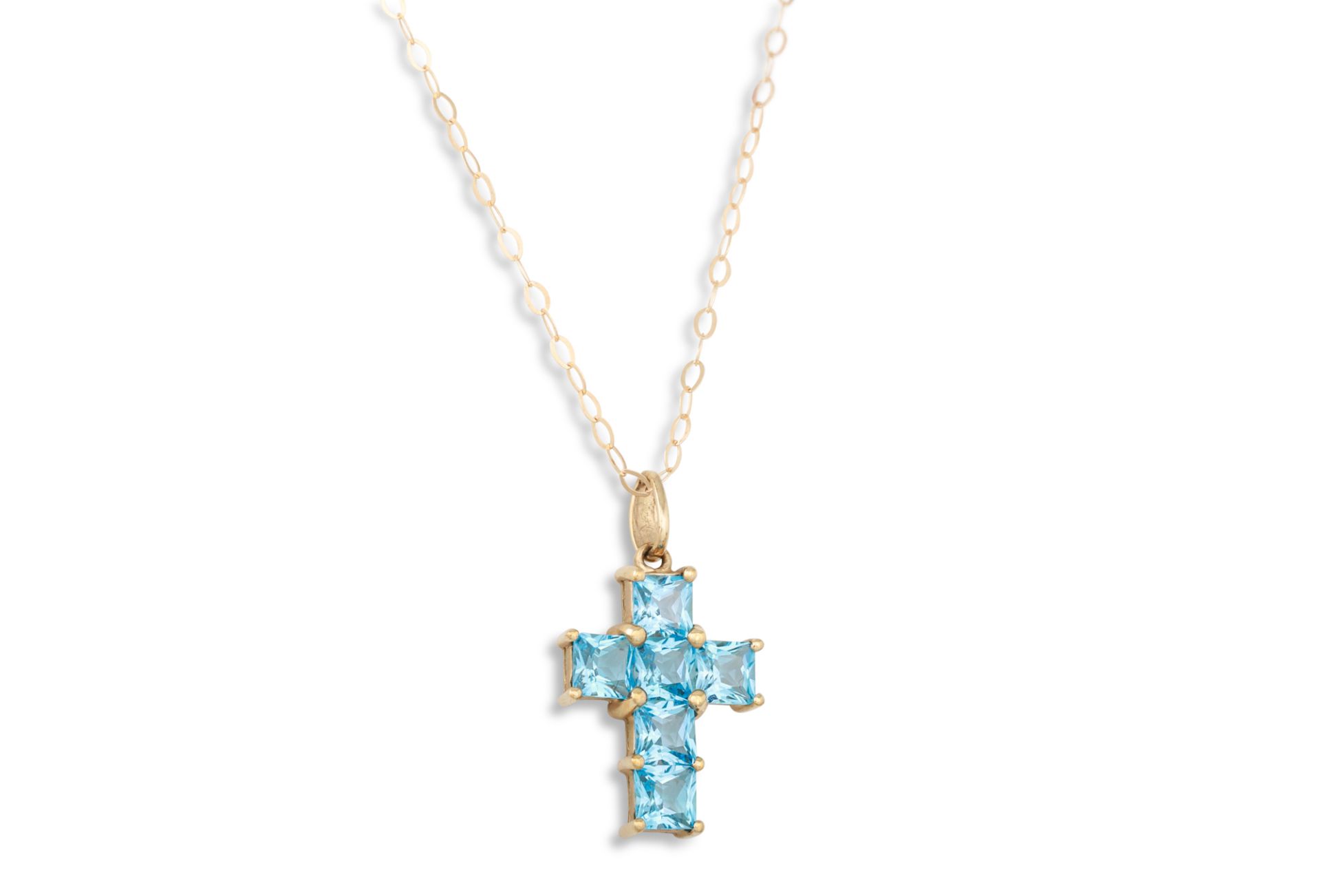 A TOPAZ AND 9CT GOLD CROSS, on a 9ct gold chain