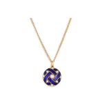 AN ANTIQUE PEARL AND ENAMEL LOCKET, the plaited enamel design set with pearls, on a 15ct gold chain,