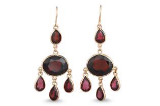 A PAIR OF GARNET DROP EARRINGS, gold mounted in chandelier style, Shepard hook fitting