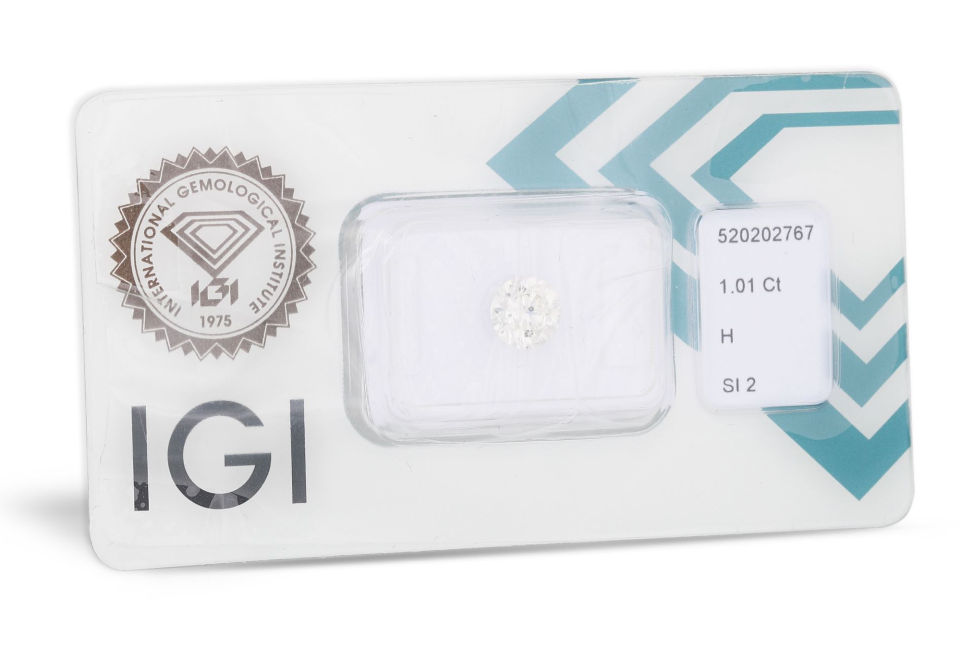 AN UNMOUNTED DIAMOND, in a sealed IGI packet. Together with an IGI Cert stating: 1.01 ct, colour and