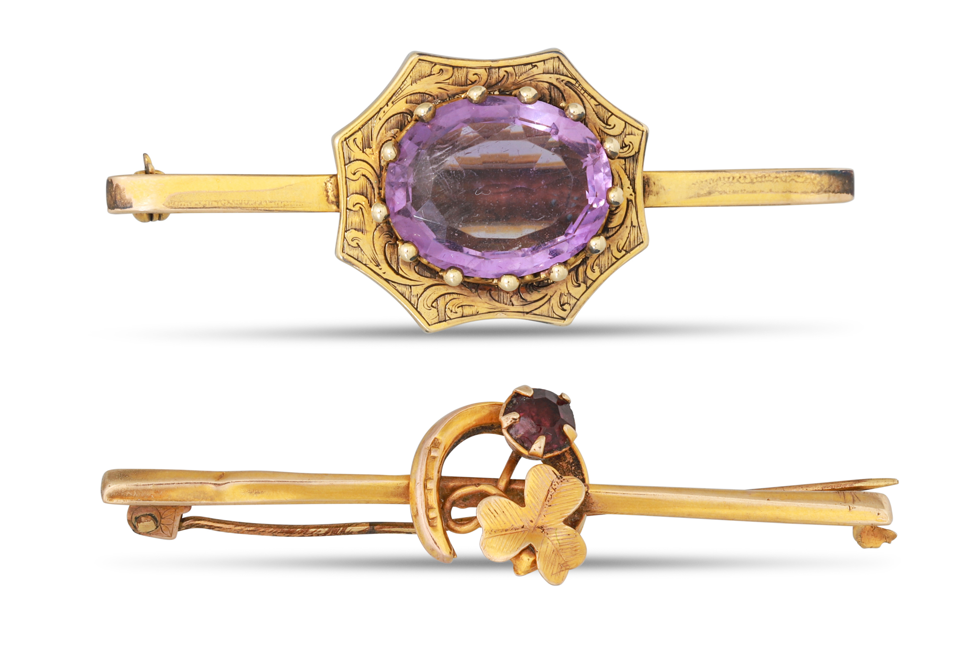 TWO AMETHYST SET BROOCHES, mounted in 9ct gold, 8 g.