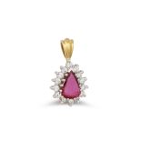 A RUBY AND DIAMOND CLUSTER PENDANT, the pear shaped ruby to a brilliant cut diamond surround,