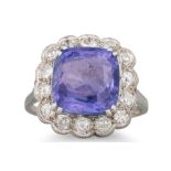 A VINTAGE SAPPHIRE AND DIAMOND CLUSTER RING, the cushion cut colour change sapphire to an old cut