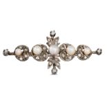 AN ANTIQUE DIAMOND AND CULTURED PEARL BROOCH, mounted in mixed white metal