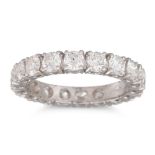A DIAMOND ETERNITY RING, the brilliant cut diamonds, mounted in 18ct white gold. Estimated: weight