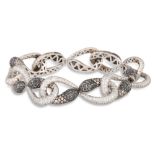 A DIAMOND SNAKE BRACELET, mounted in 18ct gold. Estimated: weight of diamonds: 3.00 ct