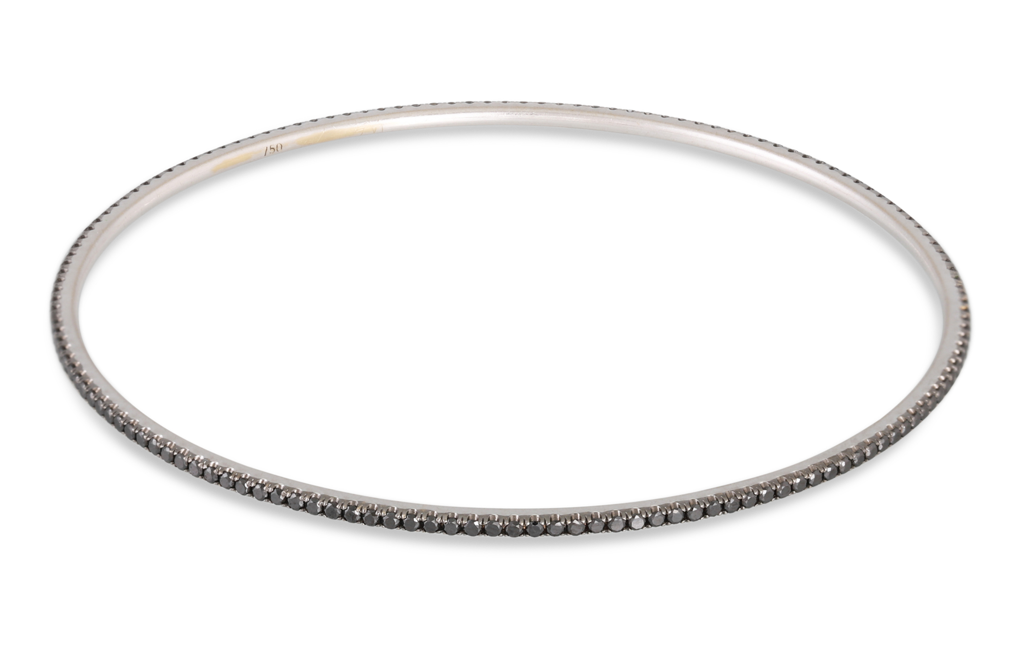 A BLACK DIAMOND BANGLE, in 18ct white gold. Estimated: weight of diamonds: 1.60 ct