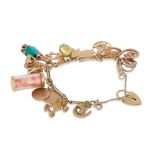 A VINTAGE 9CT GOLD CHARM BRACELET, various charms attached, gross weight 49.9 g.
