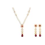 A PAIR OF INDIAN DROP EARRINGS, set with white stones, suspending cabochon rubies, mounted in 22