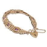 A AMETHYST SET GATE BRACELET, mounted in 9ct gold, padlock and clasp, 31 g.