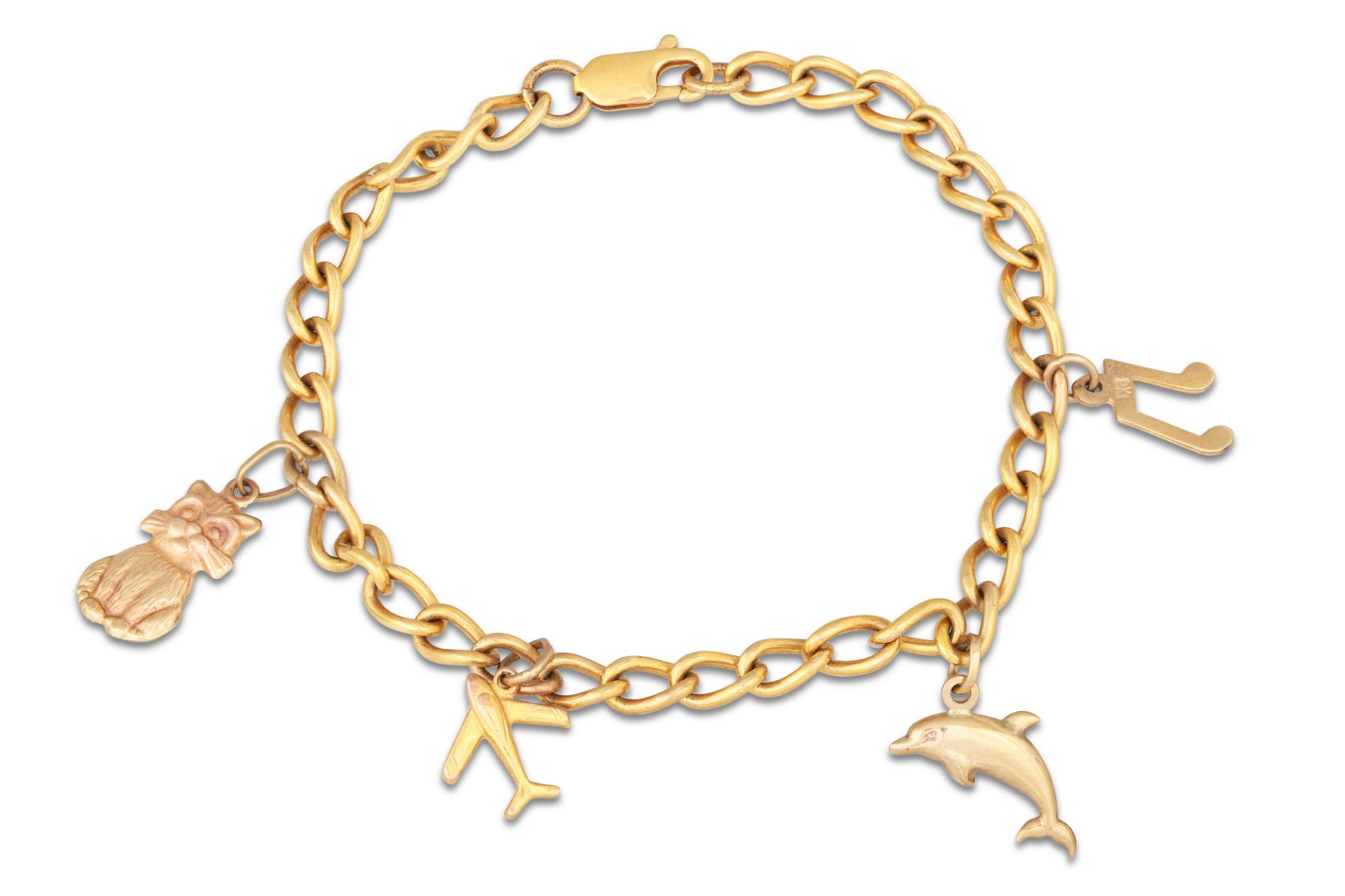 A 9CT YELLOW GOLD CURB LINK BRACELET, with four gold charms attached, 9.7 g.