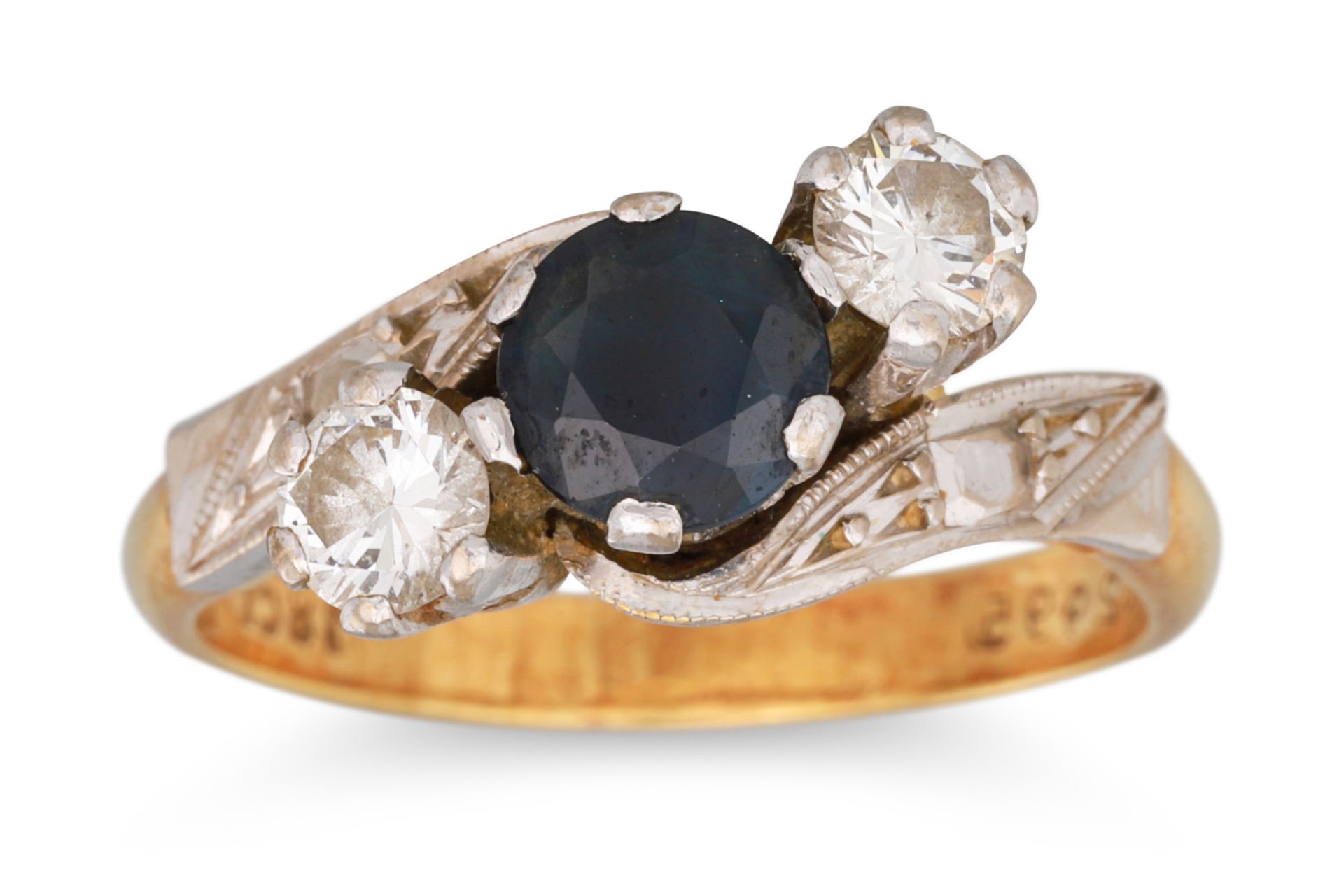 A SAPPHIRE AND DIAMOND THREE STONE RING, the cross-over setting mounted in 18ct yellow gold, 5.4