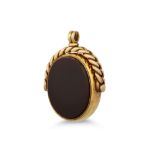 AN ANTIQUE CARNELIAN AND BLOODSTONE SET SWIVEL SEAL, mounted in 9ct gold
