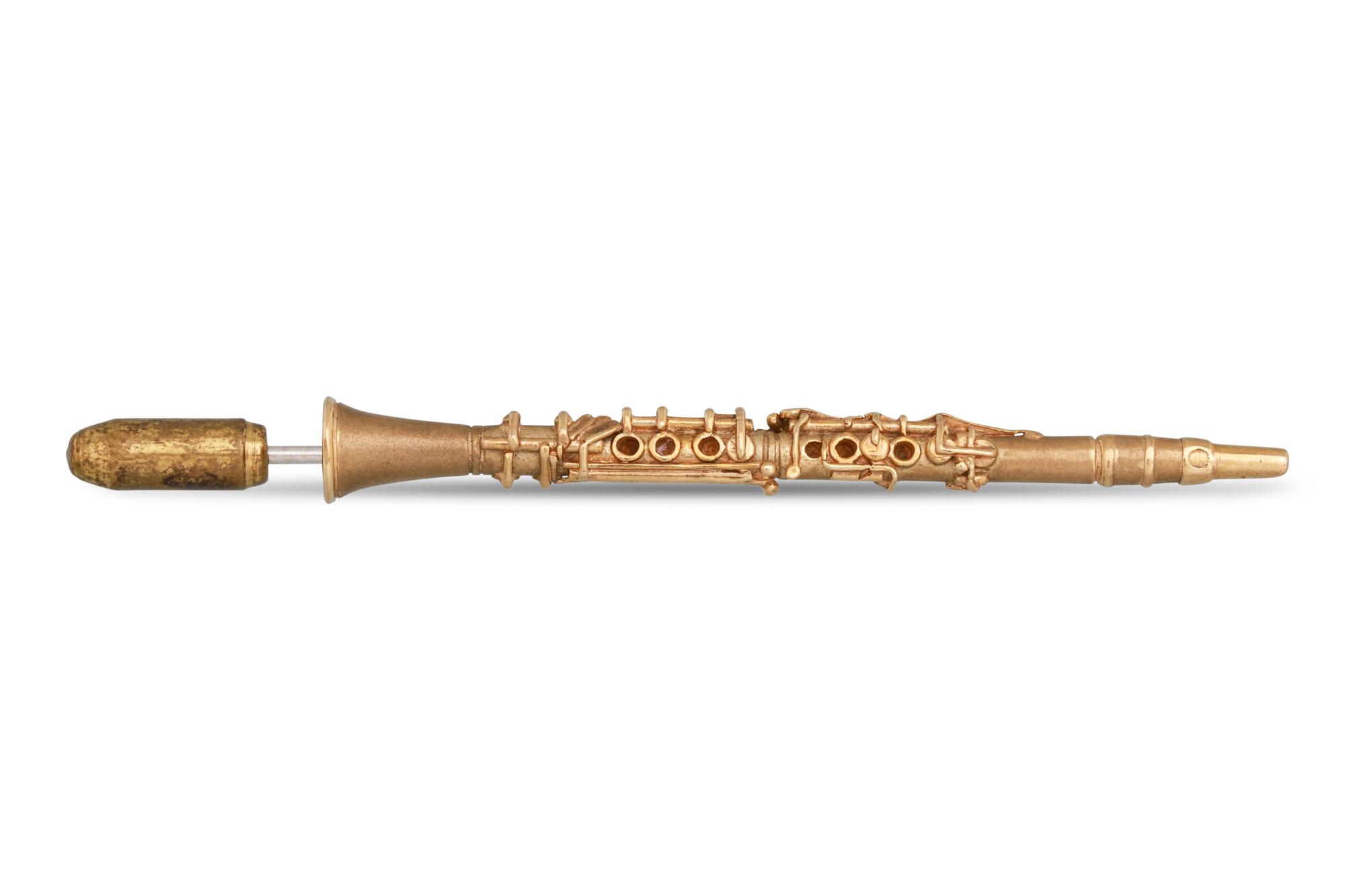 A CLARINET TIE PIN, with metal stick in 9ct gold