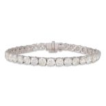 A VERY FINE DIAMOND LINE BRACELET, the brilliant cut diamonds mounted in 18ct white gold. Together