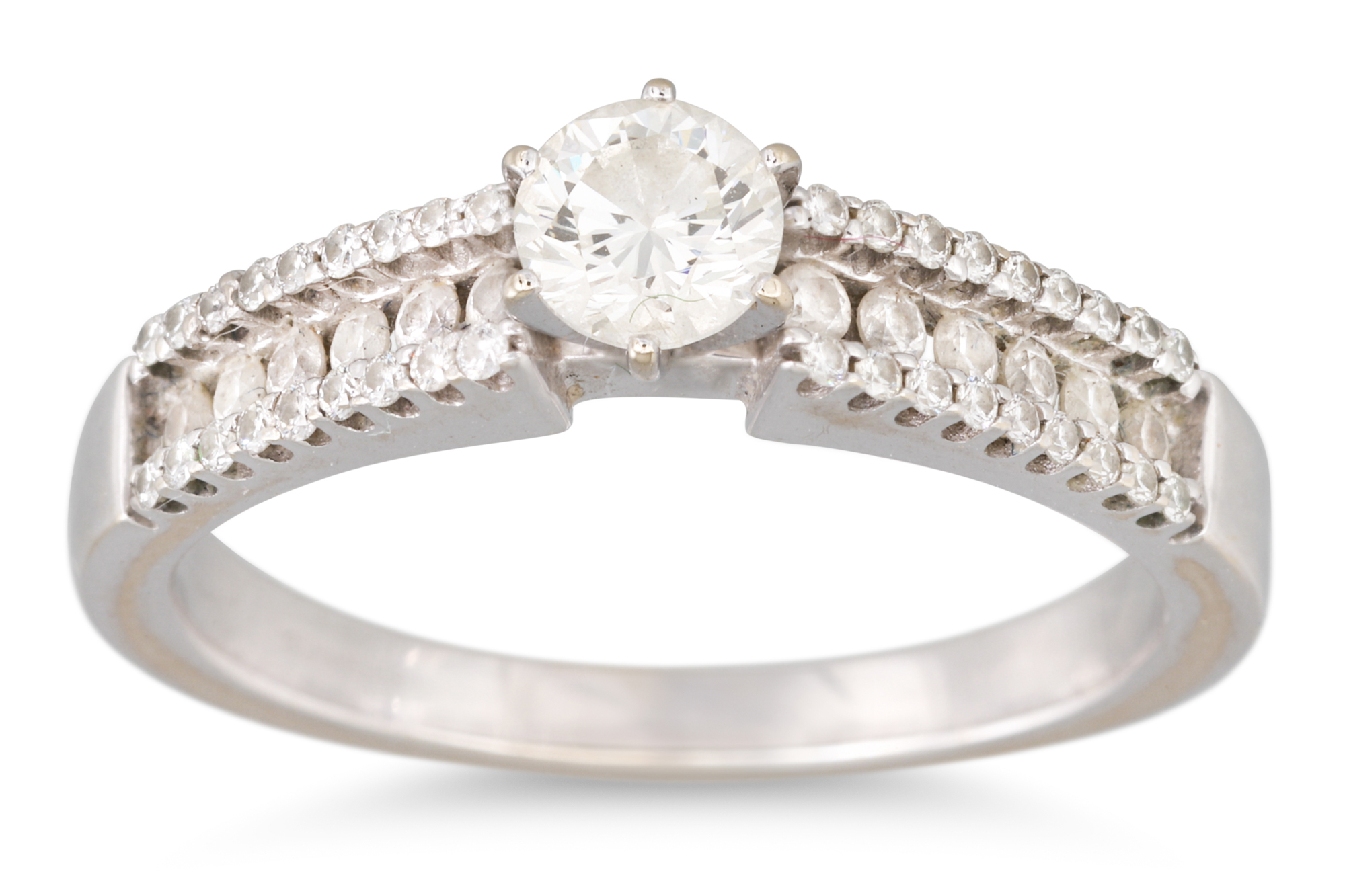 A DIAMOND SOLITAIRE RING, the brilliant cut diamond to diamond shoulders, mounted in 18ct white