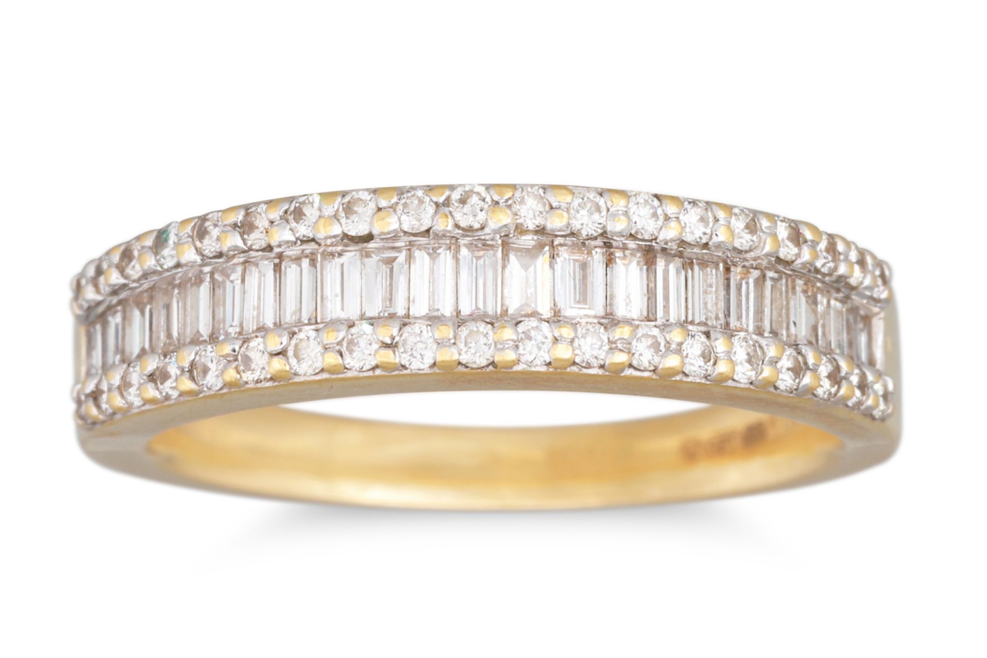 A DIAMOND TRIPLE ROW RING, mounted in 18ct yellow gold. Estimated: weight of diamonds: 0.50 ct. size