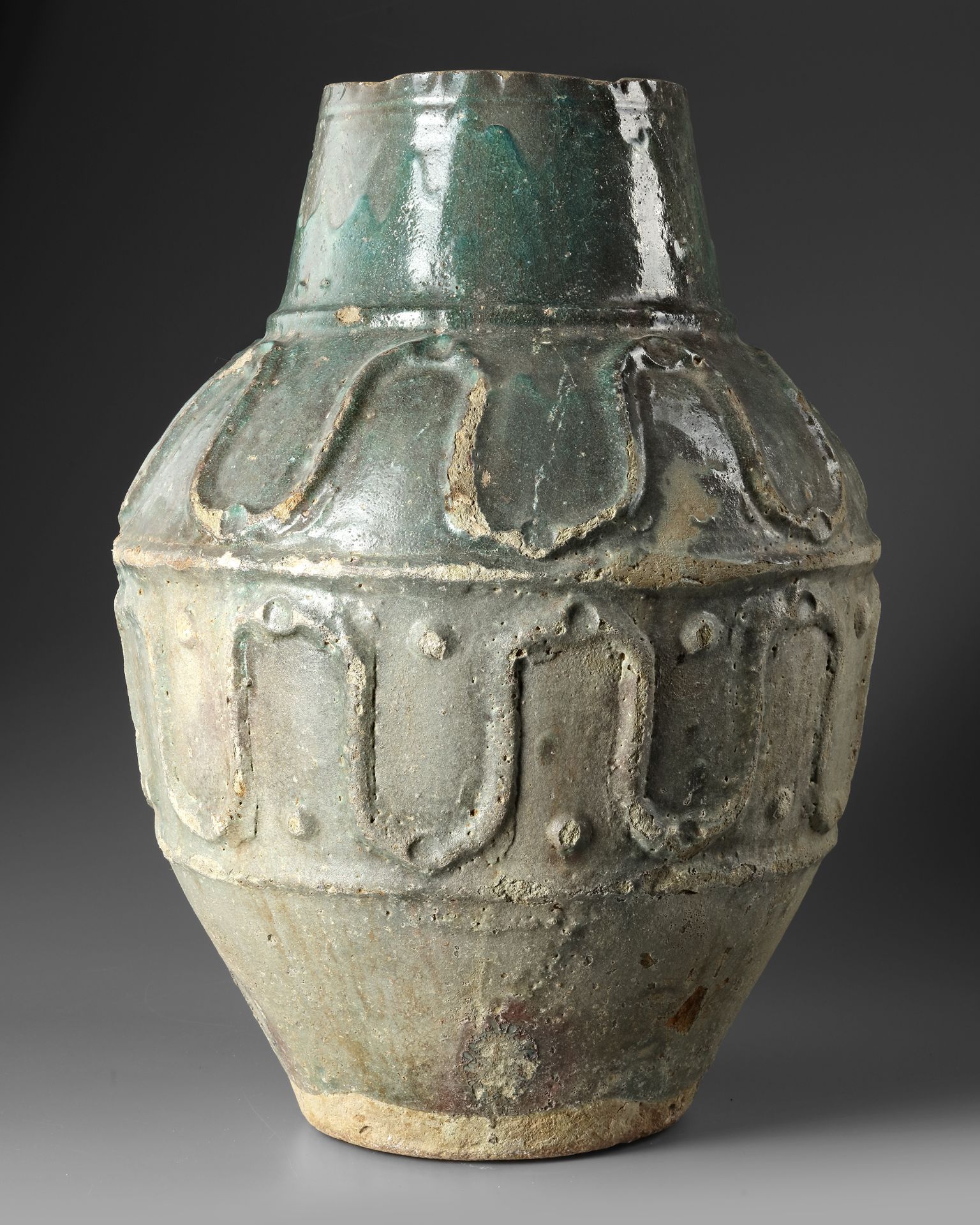 A LARGE POST-SASSANIAN TURQUOISE GLAZED STORAGE JAR, PERSIA, 8TH CENTURY