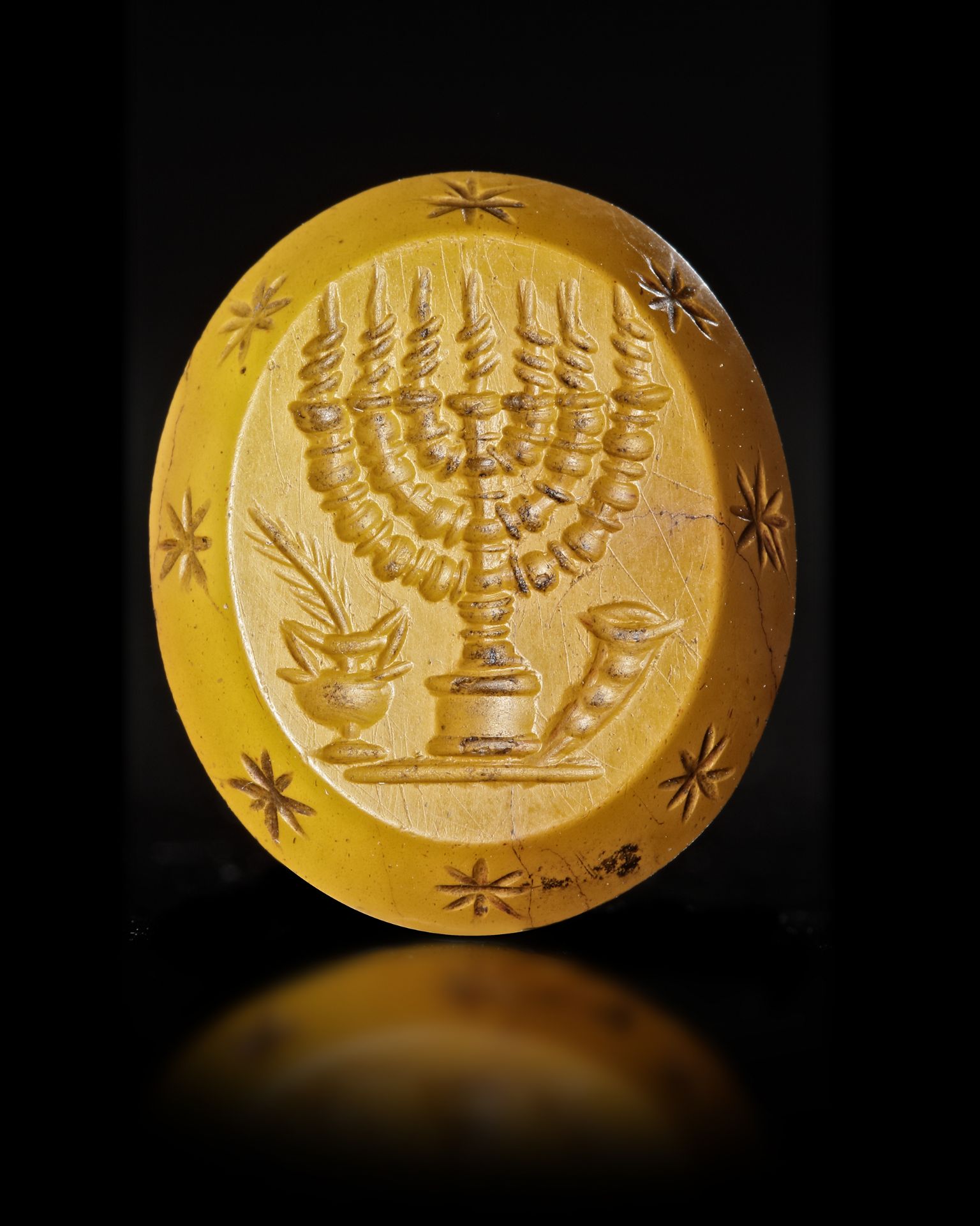A YELLOW JASPER INTAGLIO WITH A CULT DEITY AND MENORAH ON REVERSE, 3RD CENTURY OR LATER - Image 2 of 5