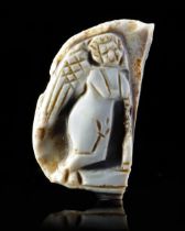 A FRAGMENTARY CAMEO OF EROS WITH A TORCH, 2ND-3RD CENTURY AD