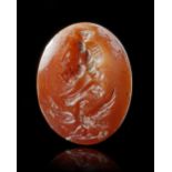A ROMAN INTAGLIO OF SERAPIS WITH EAGLE, 1ST-2ND CENTURY AD