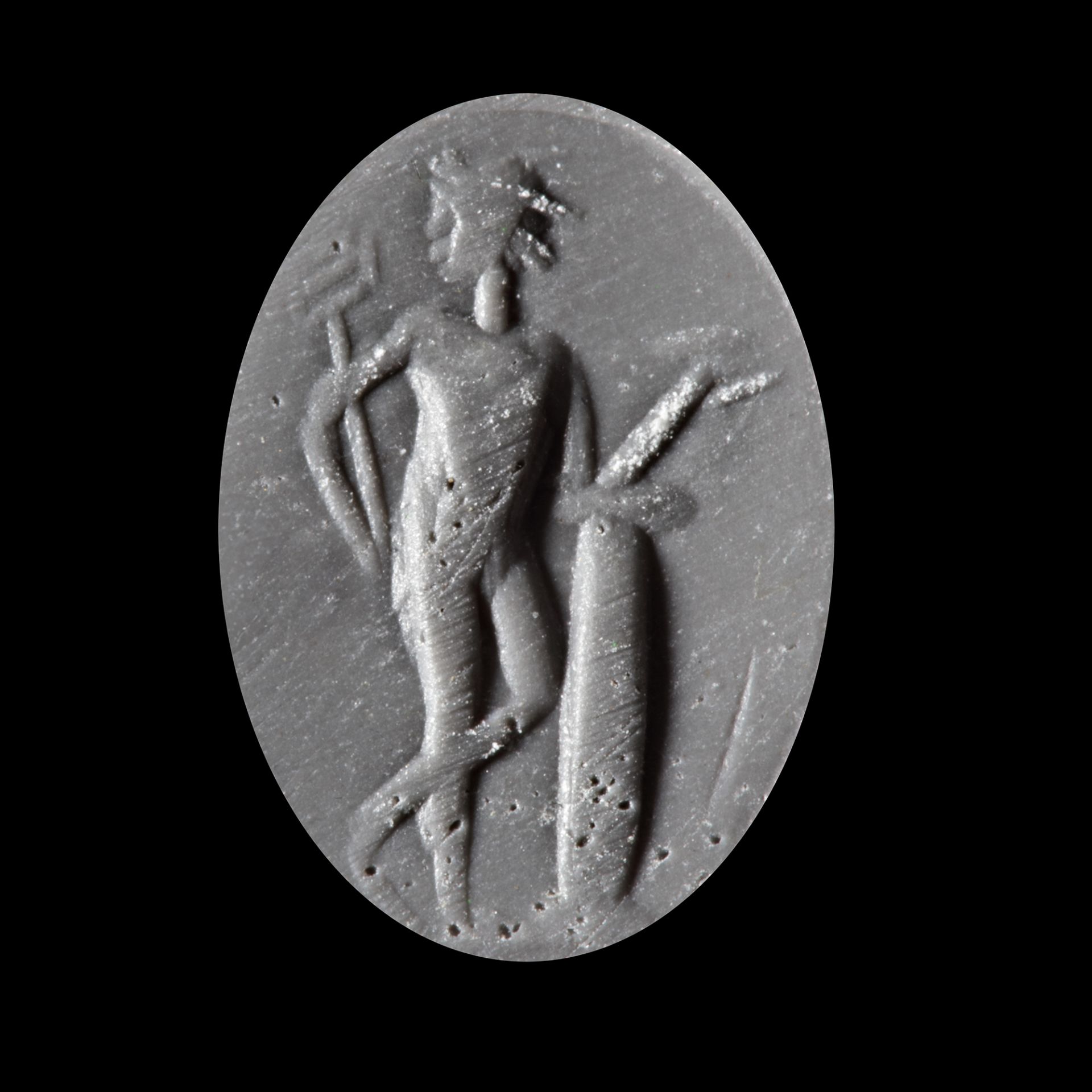 A ROMAN INTAGLIO WITH MERCURY LEANING ON A COLUMN IN BLACK JASPER, 2ND-3RD CENTURY AD - Image 2 of 2