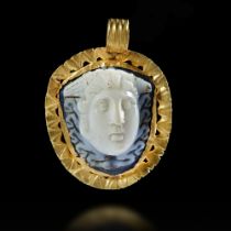 A LARGE CAMEO OF MEDUSA MOUNTED IN A GOLD FRAME, 3RD CENTURY AD