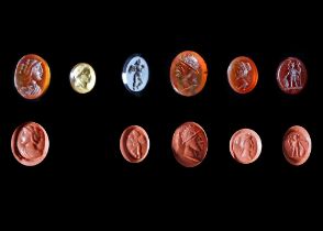 A GROUP OF FIVE MIXED INTAGLIOS, SOME ANCIENT, ONE GLASS PORTRAIT OF NAPOLEON, 19TH CENTURY AD AND E