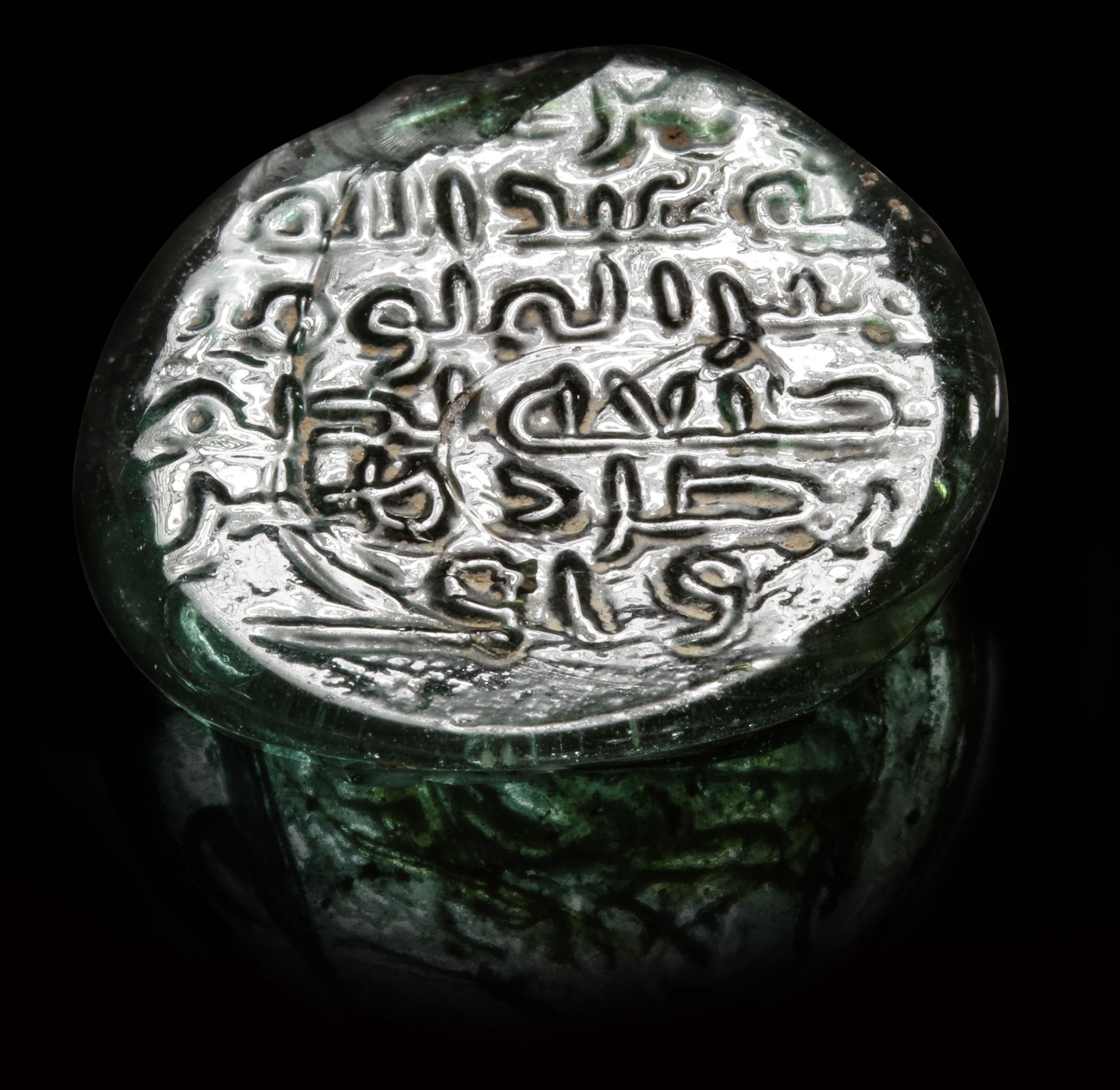 AN ISLAMIC GREEN GLASS LEAD SEAL ( BULLA), 9TH-10TH CENTURY - Image 5 of 5