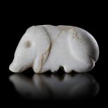 A CALCITE SEAL IN THE SHAPE OF A BOAR, NEAR EASTERN, 3RD MILLENNIUM BC