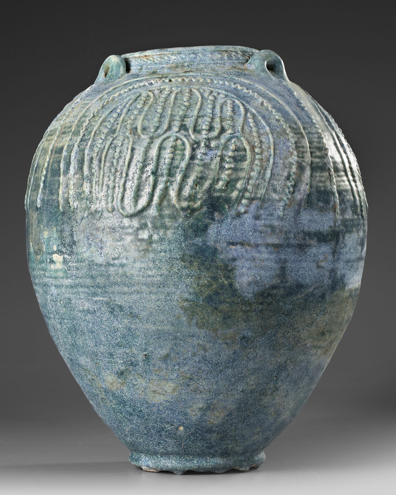 A LARGE POST SASSANIAN TURQUOISE GLAZED POTTERY STORAGE JAR, PERSIA OR IRAQ, 7TH-8TH CENTURY