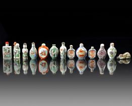 A GROUP OF THIRTEEN CHINESE FAMILLE ROSE SNUFF BOTTLES, 19TH/20TH CENTURY