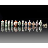 A GROUP OF THIRTEEN CHINESE FAMILLE ROSE SNUFF BOTTLES, 19TH/20TH CENTURY