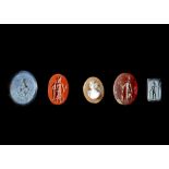 FOUR ROMAN INTAGLIOS AND A LATER CAMEO, 1ST-3RD CENTURY AD, CAMEO 18TH CENTURY AD