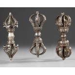 A GROUP OF THREE SINO-TIBETAN BRONZE VAJRAS, 19TH CENTURY