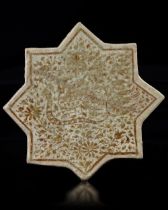 A KASHAN LUSTRE POTTERY STAR TILE, PERSIA, 13TH CENTURY