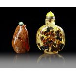 TWO CHINESE RESIN SNUFF BOTTLES, 19TH-20TH CENTURY