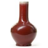 A CHINESE COPPER-RED-GLAZED BOTTLE VASE, 19TH CENTURY