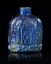 A BLUE GLASS BOTTLE, PERSIA,12TH CENTURY