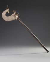 A CEREMONIAL GOLD-DAMASCENED STEEL AXE, INDIA, DATED 1120 AH/1708 AD