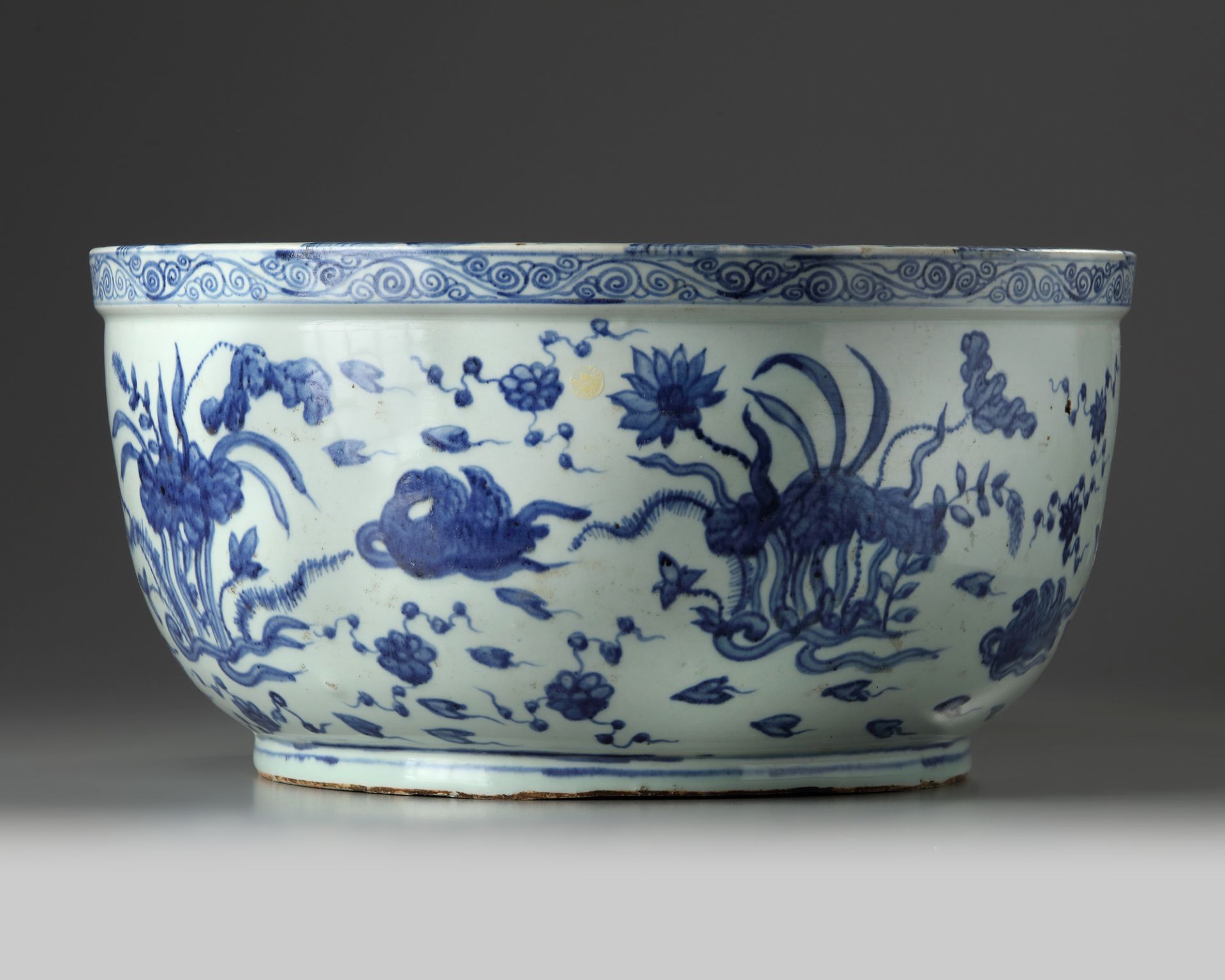 A CHINESE BLUE AND WHITE DUCKS AND LOTUS' BASIN, MING DYNASTY (1368-1644)