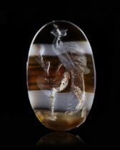 A BANDED AGATE INTAGLIO WITH A PEACOCK, 1ST-2ND CENTURY BC