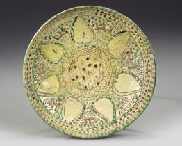 A NISHAPUR BUFFWARE POTTERY BOWL, PERSIA, 10TH CENTURY