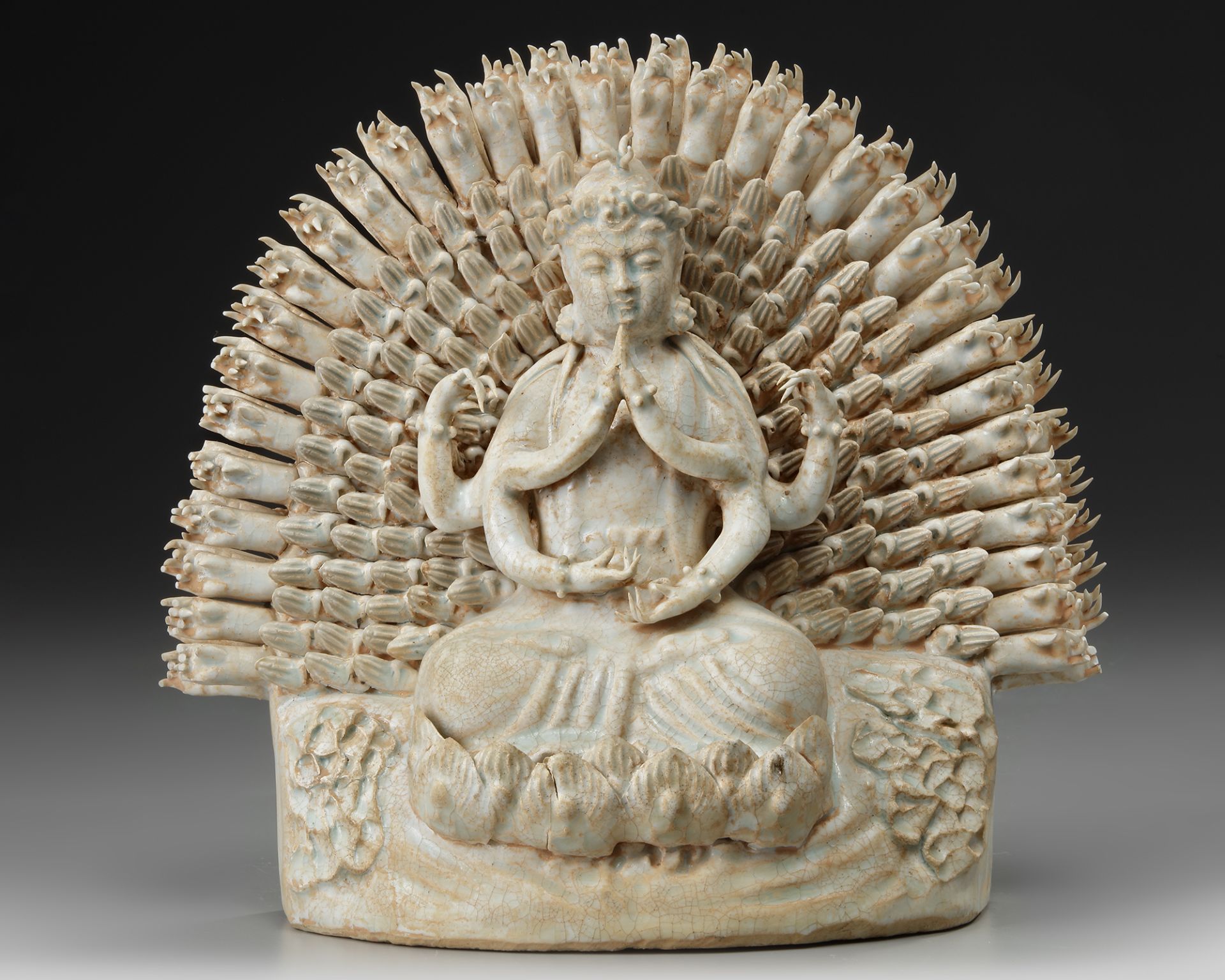A CHINESE QINGBAI STATUE OF GUANYIN, MING DYNASTY (1368-1644)