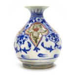 A SAFAVID RED AND BLUE KIRMAN POTTERY QALYAN BASE (WATER PIPE), PERSIA, 17TH CENTURY