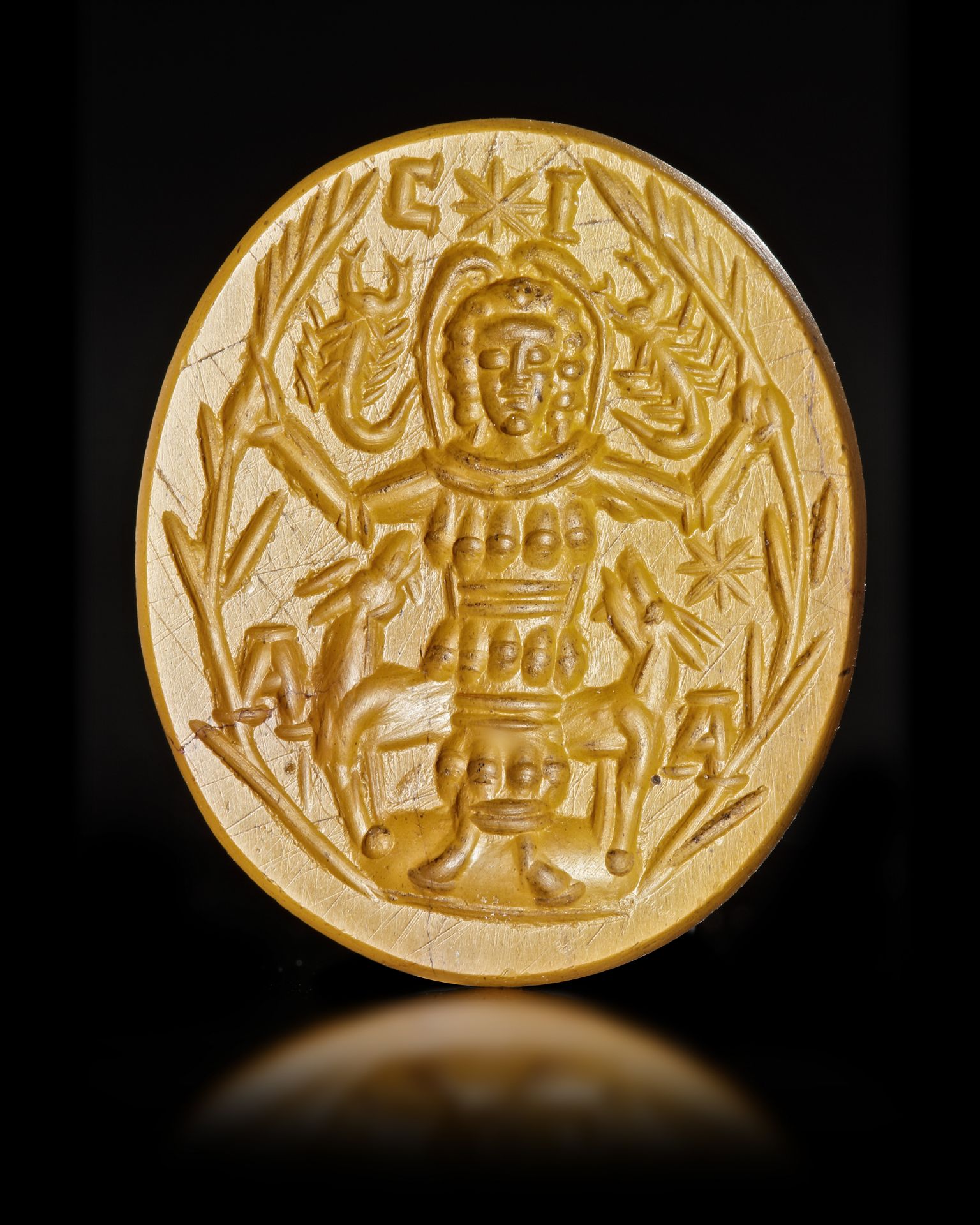 A YELLOW JASPER INTAGLIO WITH A CULT DEITY AND MENORAH ON REVERSE, 3RD CENTURY OR LATER - Image 3 of 5