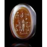 A BANDED AGATE ROMAN INTAGLIO OF SERAPIS, 1ST-2ND CENTURY AD