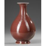 A CHINESE COPPER-RED GLAZED PEAR-SHAPED VASE, 19TH CENTURY