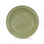 A CHINESE LONGQUAN CELADON CHARGER, YUAN DYNASTY (1271-1368)