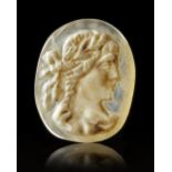 AN AGATE CAMEO OF A BUST OF APOLLO, 1ST/2ND CENTURY AD
